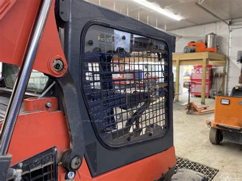 how to get metal pieces out of skid steer glass|I broke It. Kubota SSV front glass replacement. .